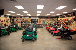 a wide shot of the showroom inside the ASC Lawn Equipment building